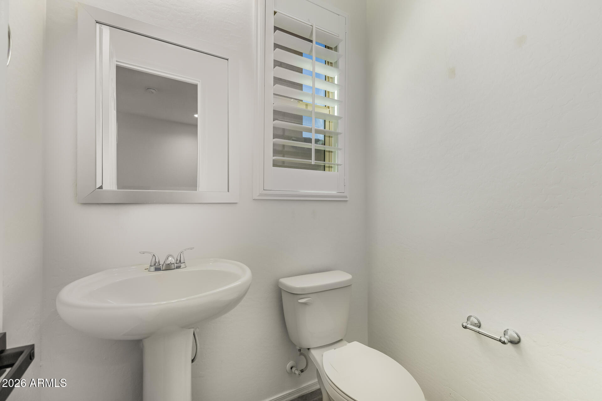 44157 West Palo Olmo Road Maricopa, AZ 85138 - Photo 12 of 34 a bathroom with a sink and a toilet