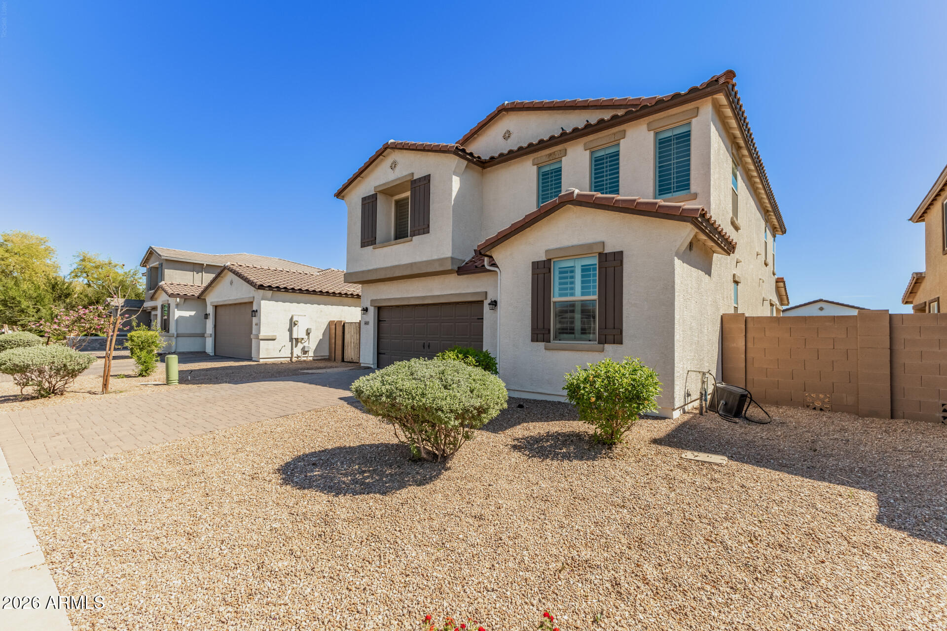 44157 West Palo Olmo Road Maricopa, AZ 85138 - Photo 3 of 34 a front view of a house with garden