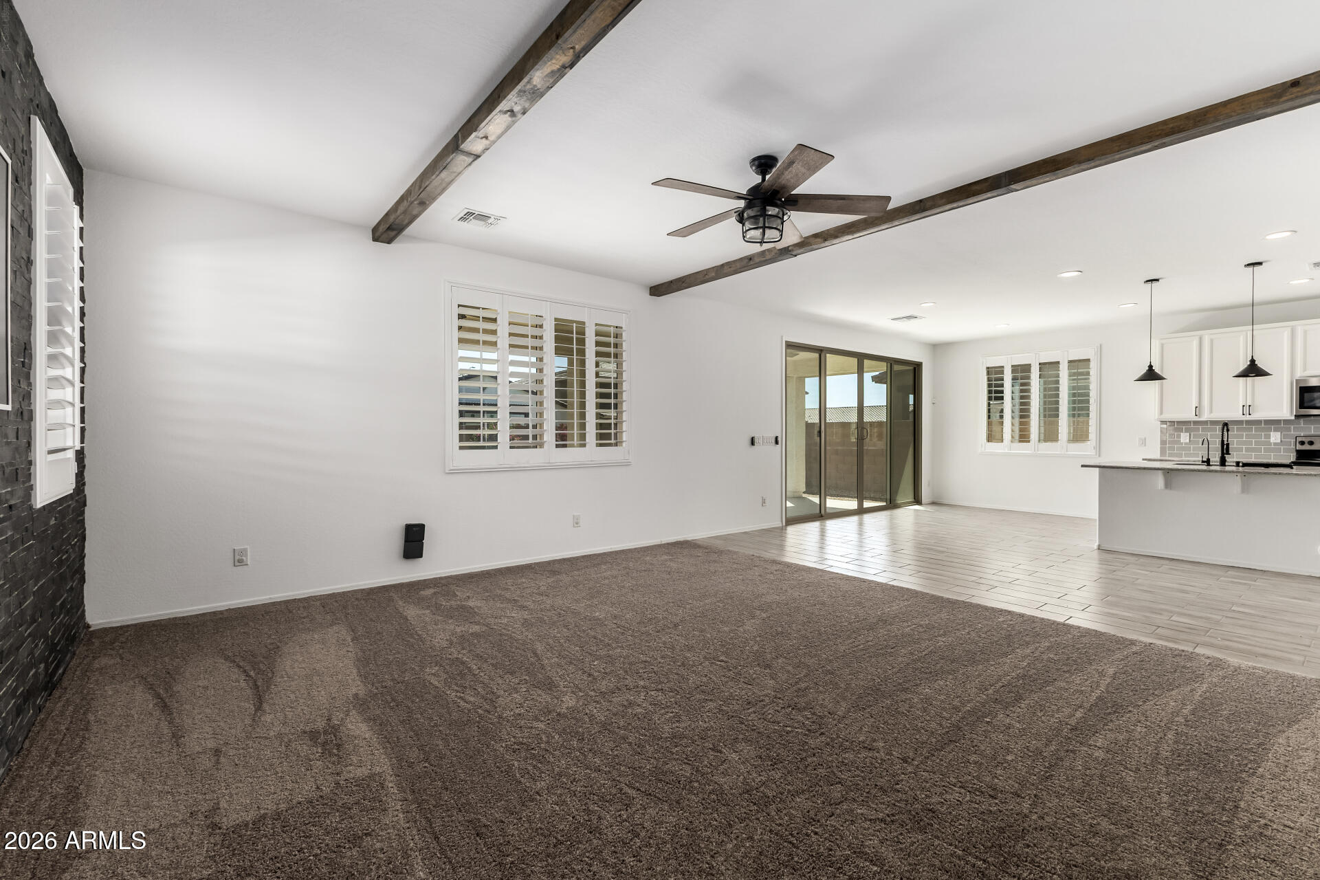 44157 West Palo Olmo Road Maricopa, AZ 85138 - Photo 6 of 34 a view of an empty room with a window