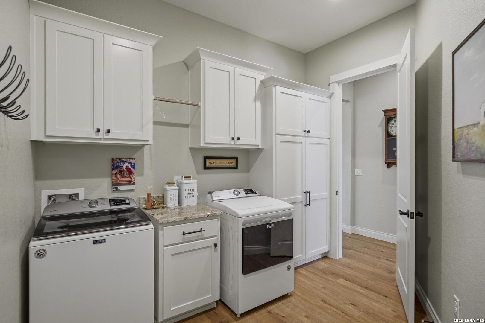 134 Stallion Estates Drive Spring Branch, TX 78070 - Photo 20 of 67 a kitchen with stainless steel appliances granite countertop a sink and a refrigerator