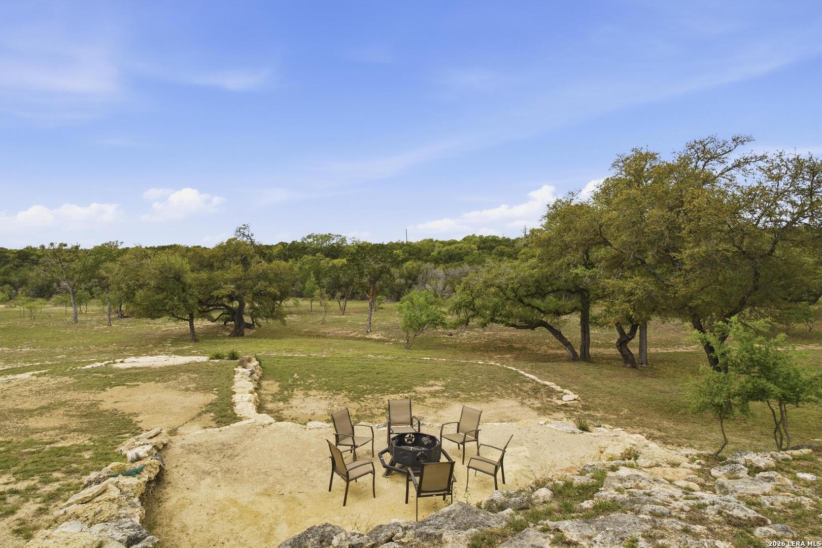 134 Stallion Estates Drive Spring Branch, TX 78070 - Photo 47 of 67 a view of a lake with a yard