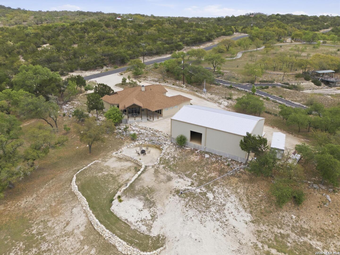 134 Stallion Estates Drive Spring Branch, TX 78070 - Photo 63 of 67 an aerial view of residential houses with outdoor space and ocean view