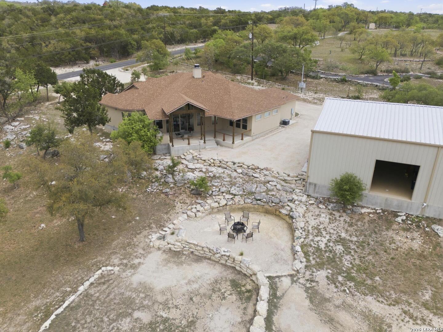 134 Stallion Estates Drive Spring Branch, TX 78070 - Photo 64 of 67 an aerial view of a house with a yard and mountain