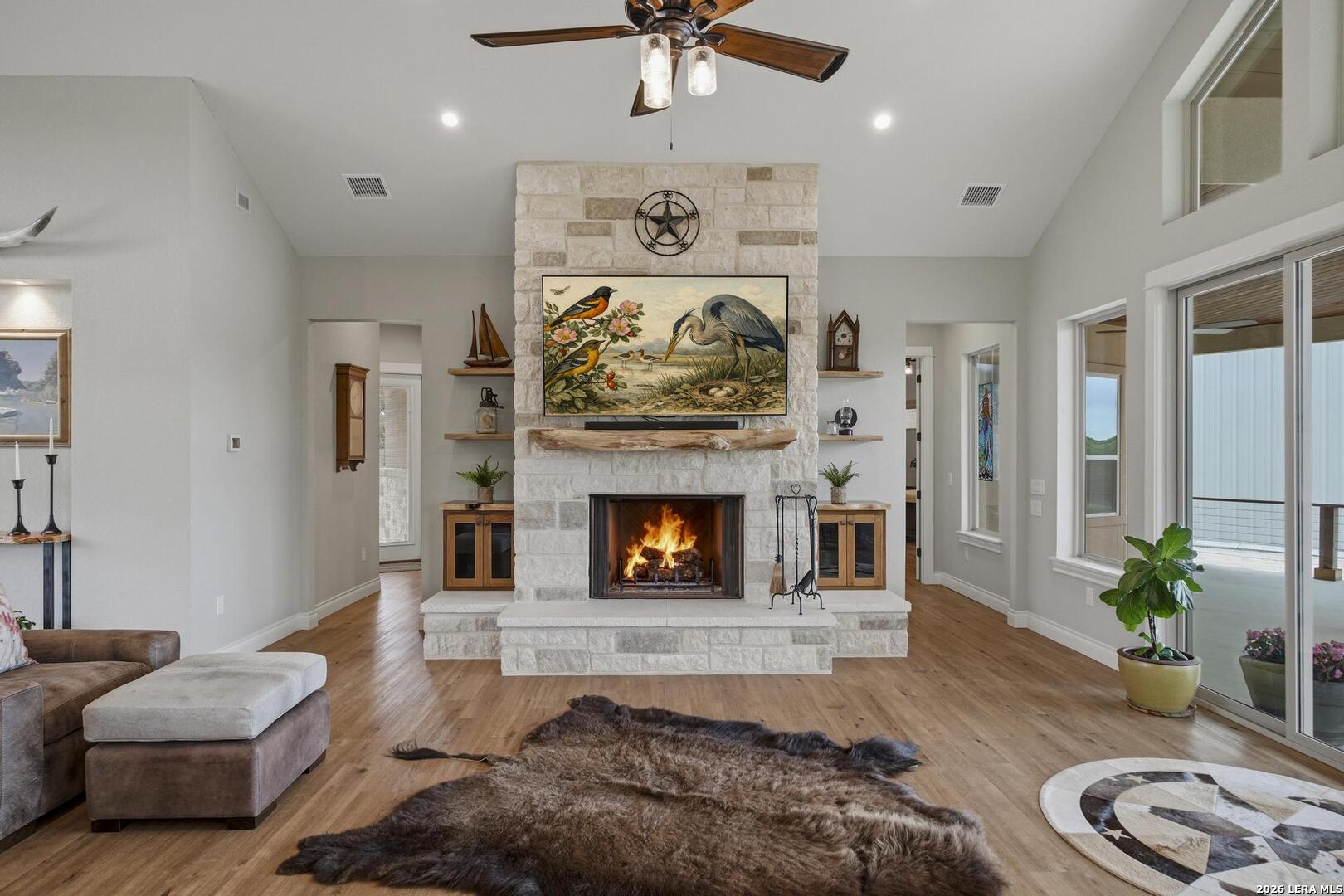 134 Stallion Estates Drive Spring Branch, TX 78070 - Photo 8 of 67 a living room with furniture and a fireplace