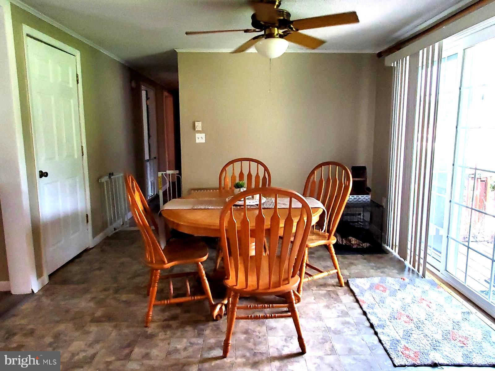 269 Walker School Road Townsend, DE 19734 - Photo 44 of 57 Walk in Pantry door to the left of table