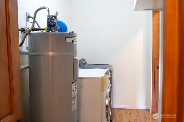9844 173rd Avenue Southwest Rochester, WA 98579 - Photo 11 of 38 a close view of a utility room with dryer and washer