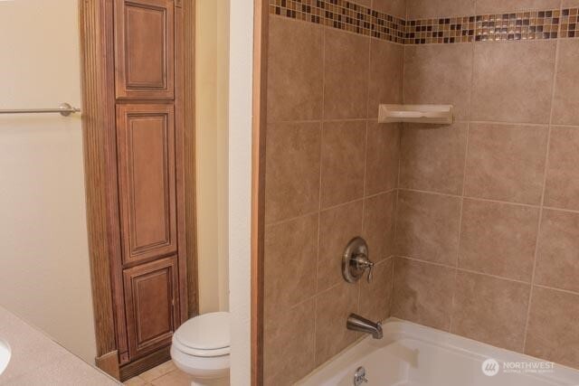 9844 173rd Avenue Southwest Rochester, WA 98579 - Photo 15 of 38 a bathroom with a granite countertop bathtub shower