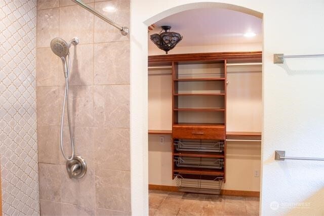 9844 173rd Avenue Southwest Rochester, WA 98579 - Photo 19 of 38 a view of walk in closet with empty racks