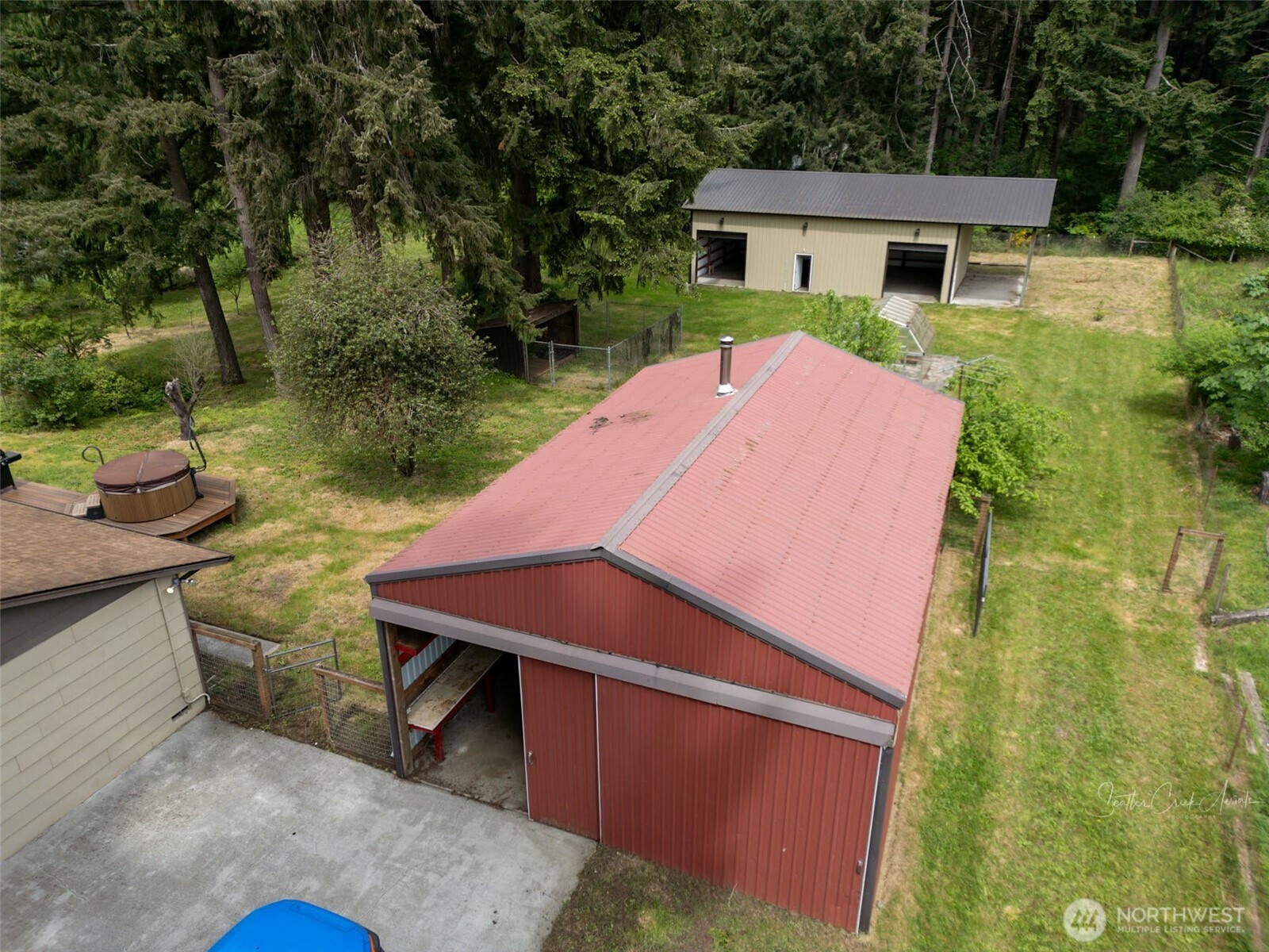 9844 173rd Avenue Southwest Rochester, WA 98579 - Photo 24 of 38 a view of a house with pool