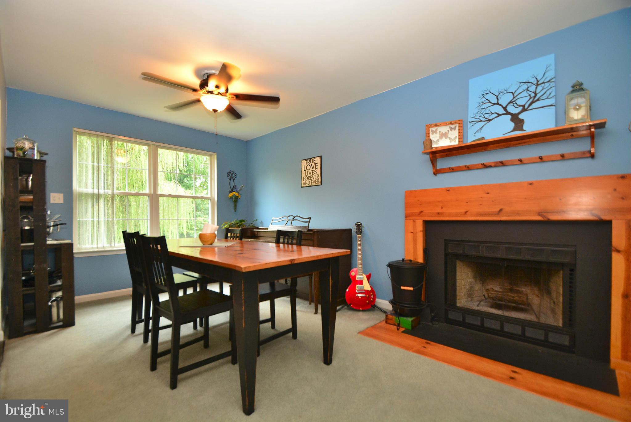 716 Carrollwood Road Baltimore, MD 21220 - Photo 7 of 30 Dining Room with cozy fireplace