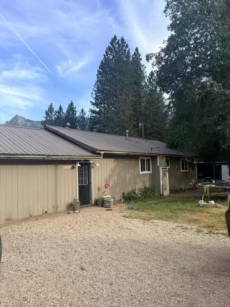15440 Old Wagon Road Crescent Mills, CA 95934 - Photo 1 of 19 a house with trees in the background