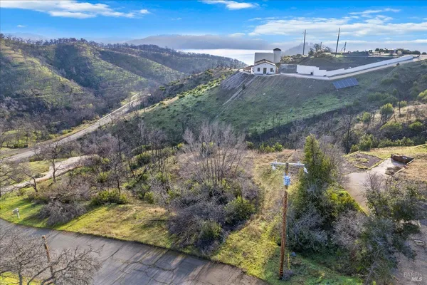 a view of a town with mountains in the background