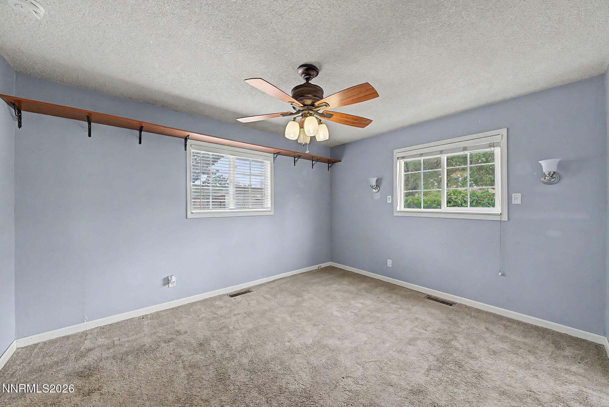 11577 Deodar Way Reno, NV 89506 - Photo 22 of 58 a view of an empty room with a window