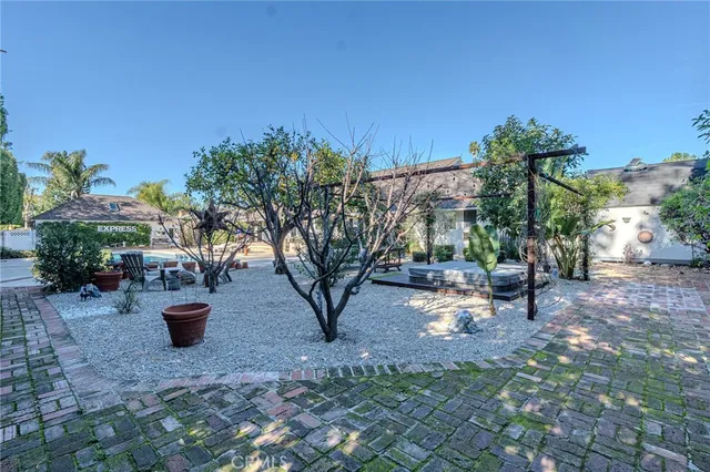 a view of a bench in a backyard