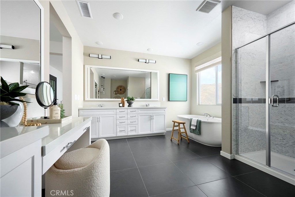 26159 Pepper Tree Ridge Road Corona, CA 92883 - Photo 10 of 16 Model Photos: Photos shown are of the model home for this floor plan. Actual finishes, features, and landscaping may vary.