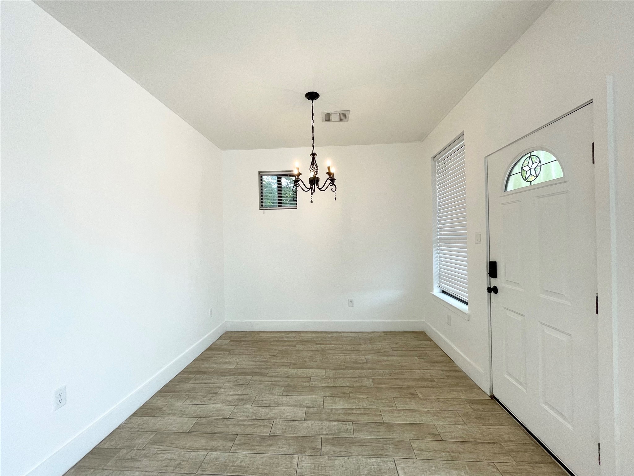 5121 Southwind Street, Unit B Houston, TX 77033 - Photo 6 of 24 wooden floor in an empty room
