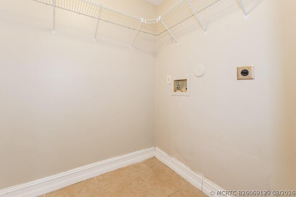 Undisclosed Address Boca Raton, FL 33428 - Photo 5 of 13 08-LaundryRoom_20260820194704-lg