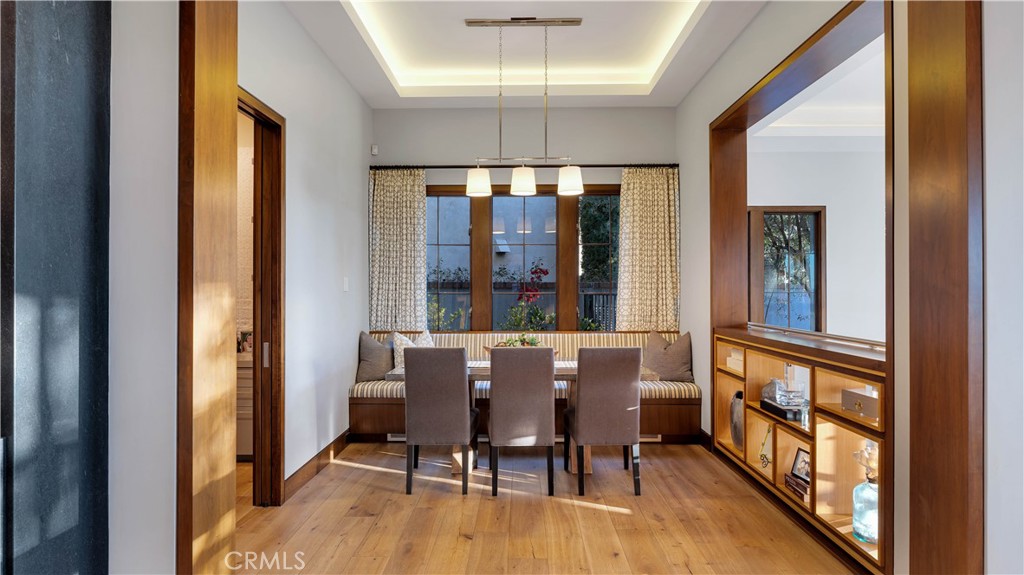 2 Thomas Road Ladera Ranch, CA 92694 - Photo 12 of 69 a view of a dining room with furniture wooden floor and chandelier