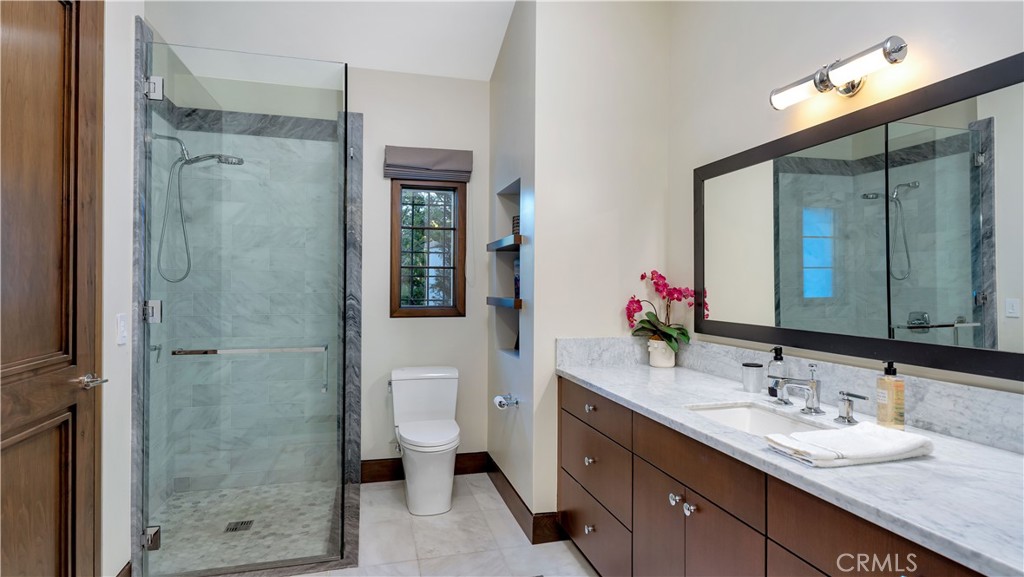 2 Thomas Road Ladera Ranch, CA 92694 - Photo 36 of 69 a bathroom with a double vanity sink mirror and shower