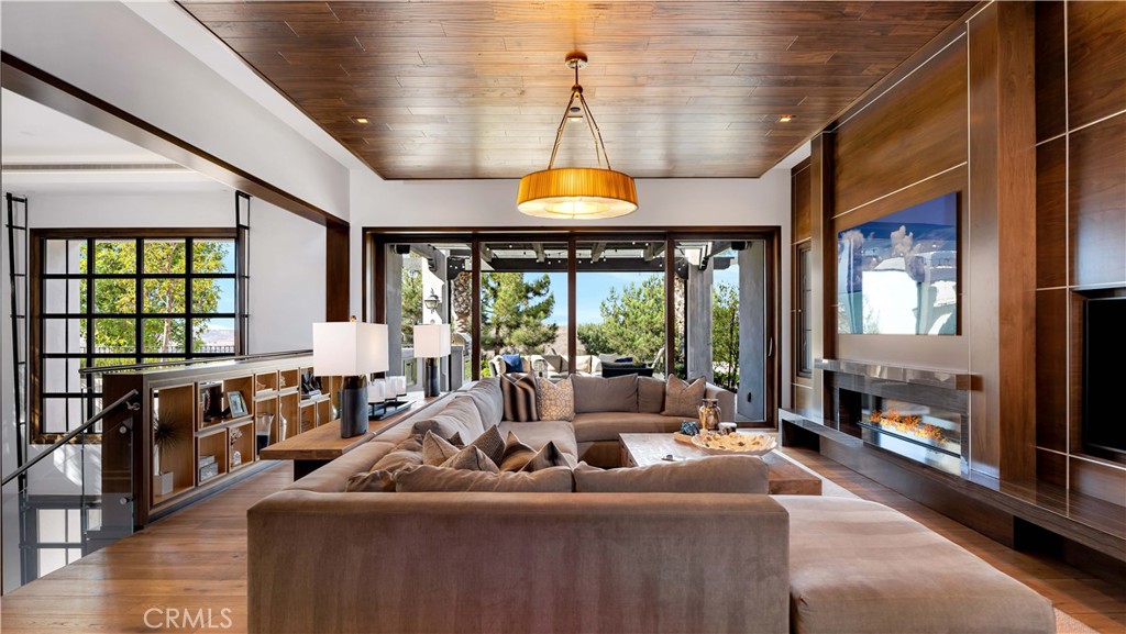 2 Thomas Road Ladera Ranch, CA 92694 - Photo 46 of 69 a living room with furniture and a chandelier