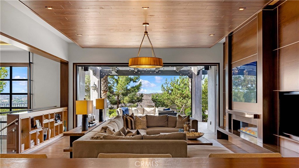 2 Thomas Road Ladera Ranch, CA 92694 - Photo 5 of 69 a living room with large windows and furniture