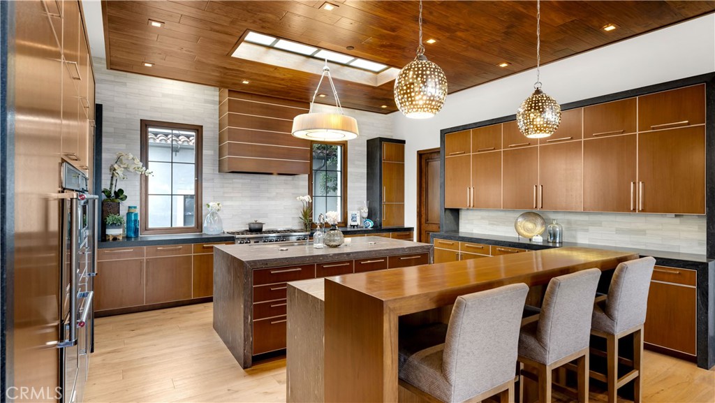 2 Thomas Road Ladera Ranch, CA 92694 - Photo 6 of 69 a kitchen with stainless steel appliances granite countertop a sink and cabinets