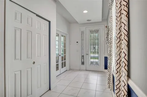 a view of an entryway with a door