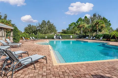 a view of a lake with a yard