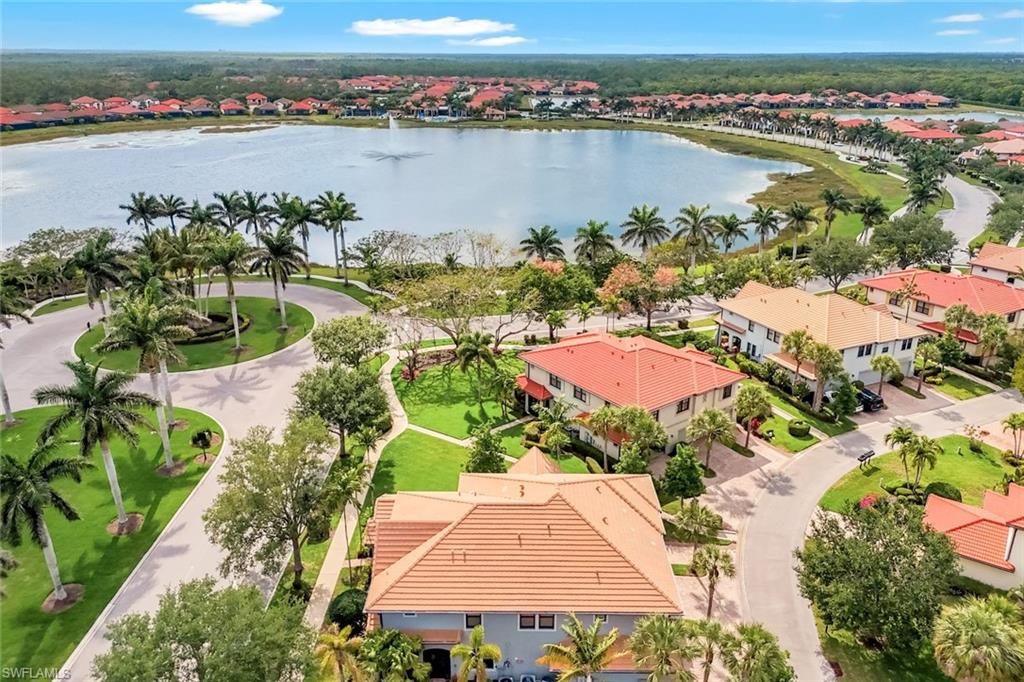 1383 Artesia Drive West, Unit 701 Naples, FL 34113 - Photo 2 of 43 an aerial view of ocean residential house with outdoor space