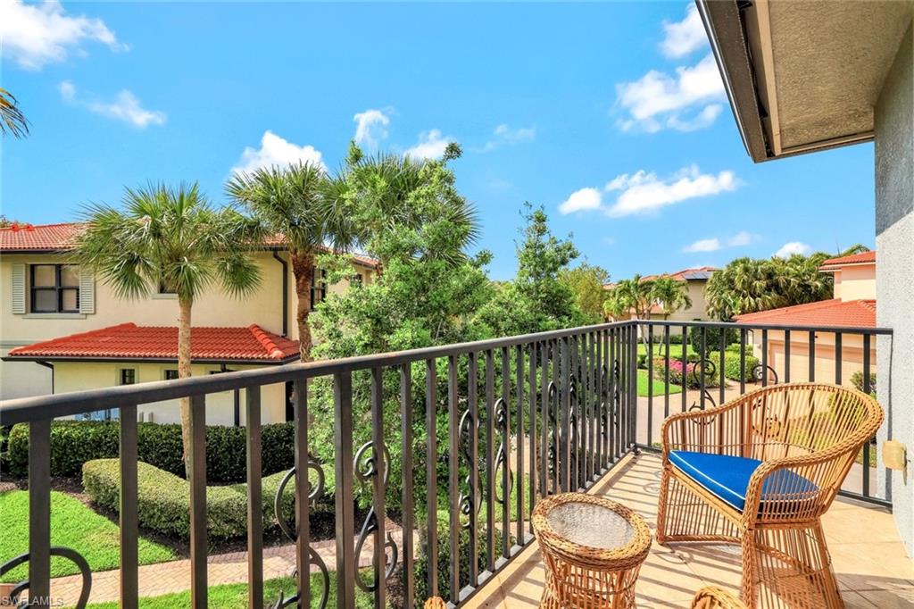1383 Artesia Drive West, Unit 701 Naples, FL 34113 - Photo 21 of 43 a view of a balcony with lake view