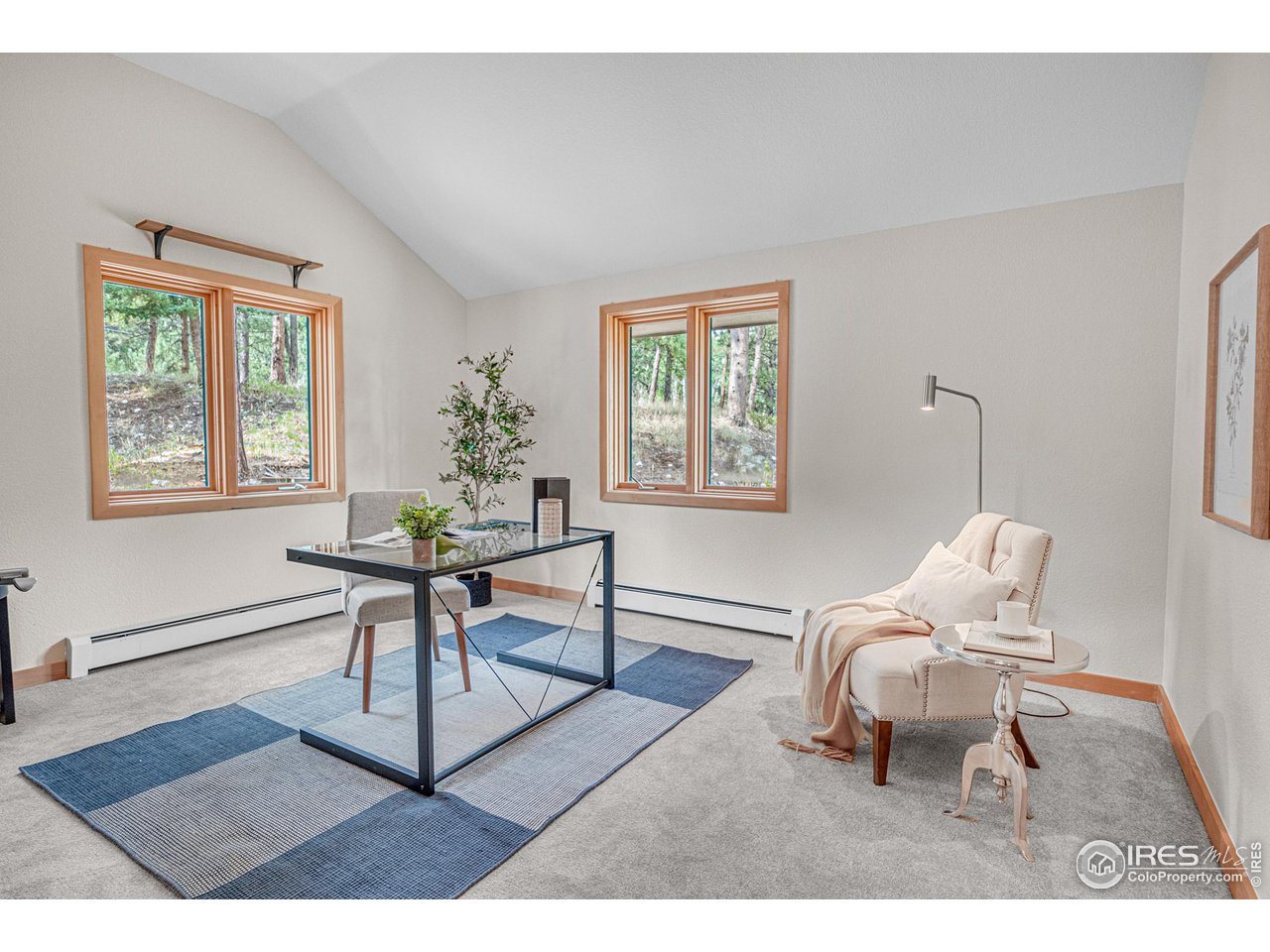 1107 Mountain Pines Road Boulder, CO 80302 - Photo 14 of 40 a living room with furniture a window and a lamp
