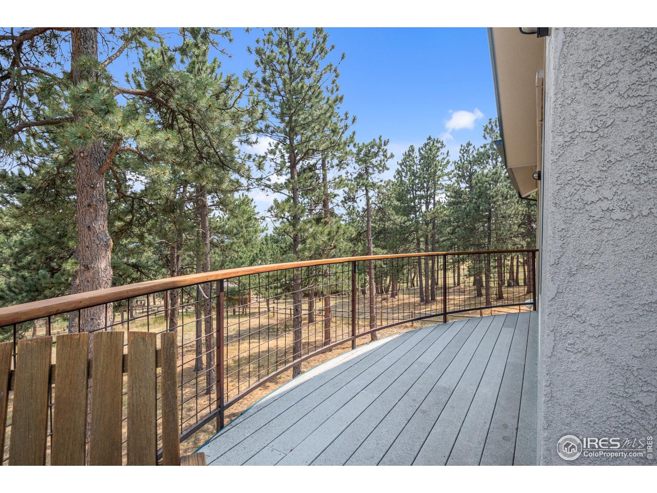 1107 Mountain Pines Road Boulder, CO 80302 - Photo 38 of 40 a view of balcony with wooden floor