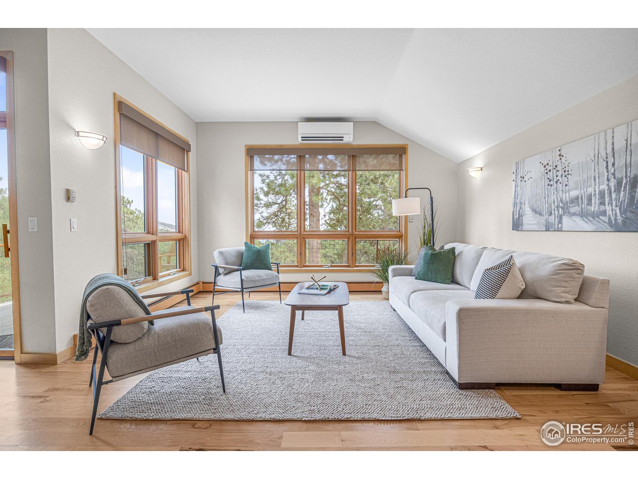1107 Mountain Pines Road Boulder, CO 80302 - Photo 7 of 40 a living room with furniture and a large window