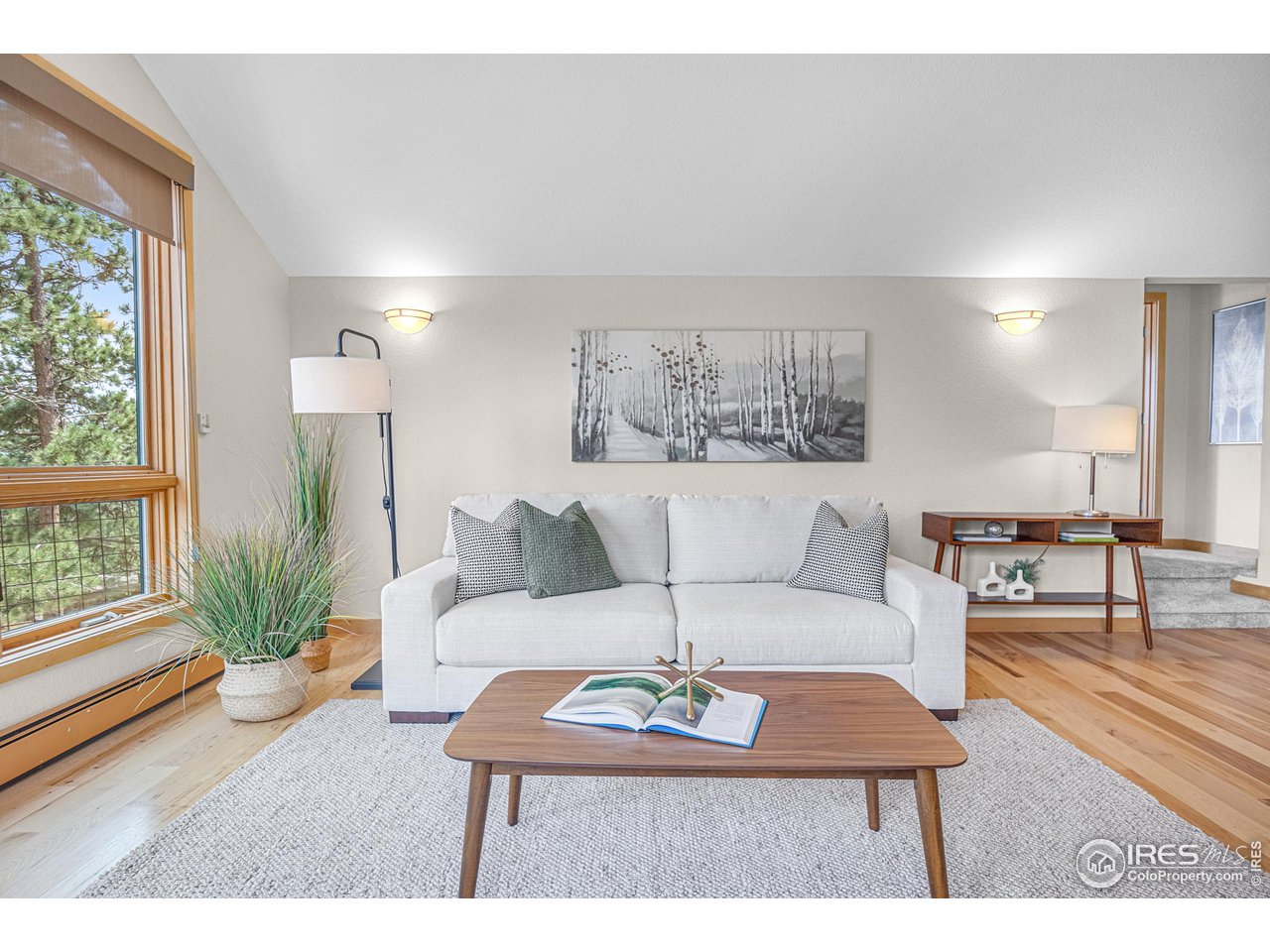 1107 Mountain Pines Road Boulder, CO 80302 - Photo 8 of 40 a living room with furniture and a large window
