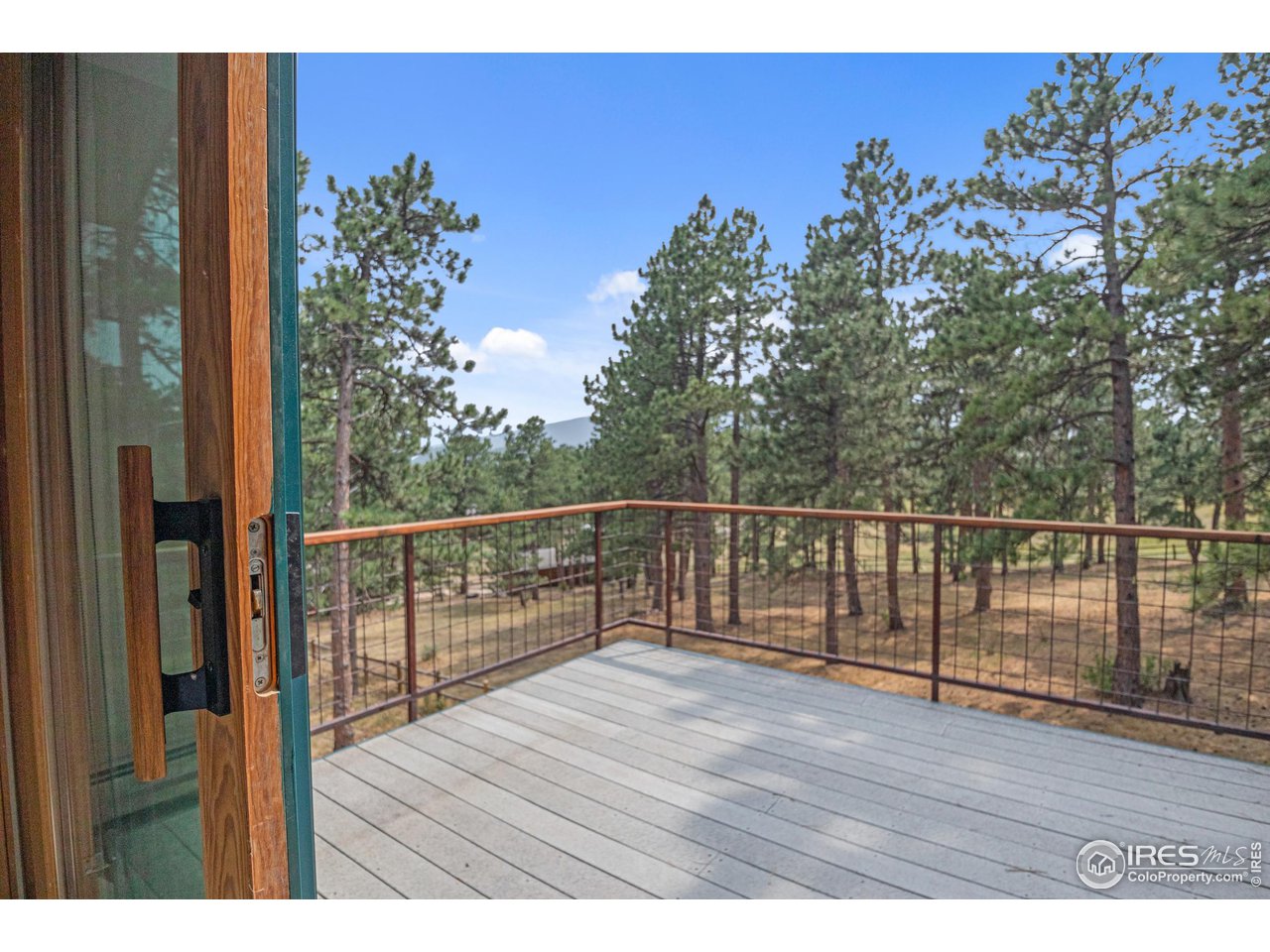 1107 Mountain Pines Road Boulder, CO 80302 - Photo 9 of 40 a view of balcony with wooden floor