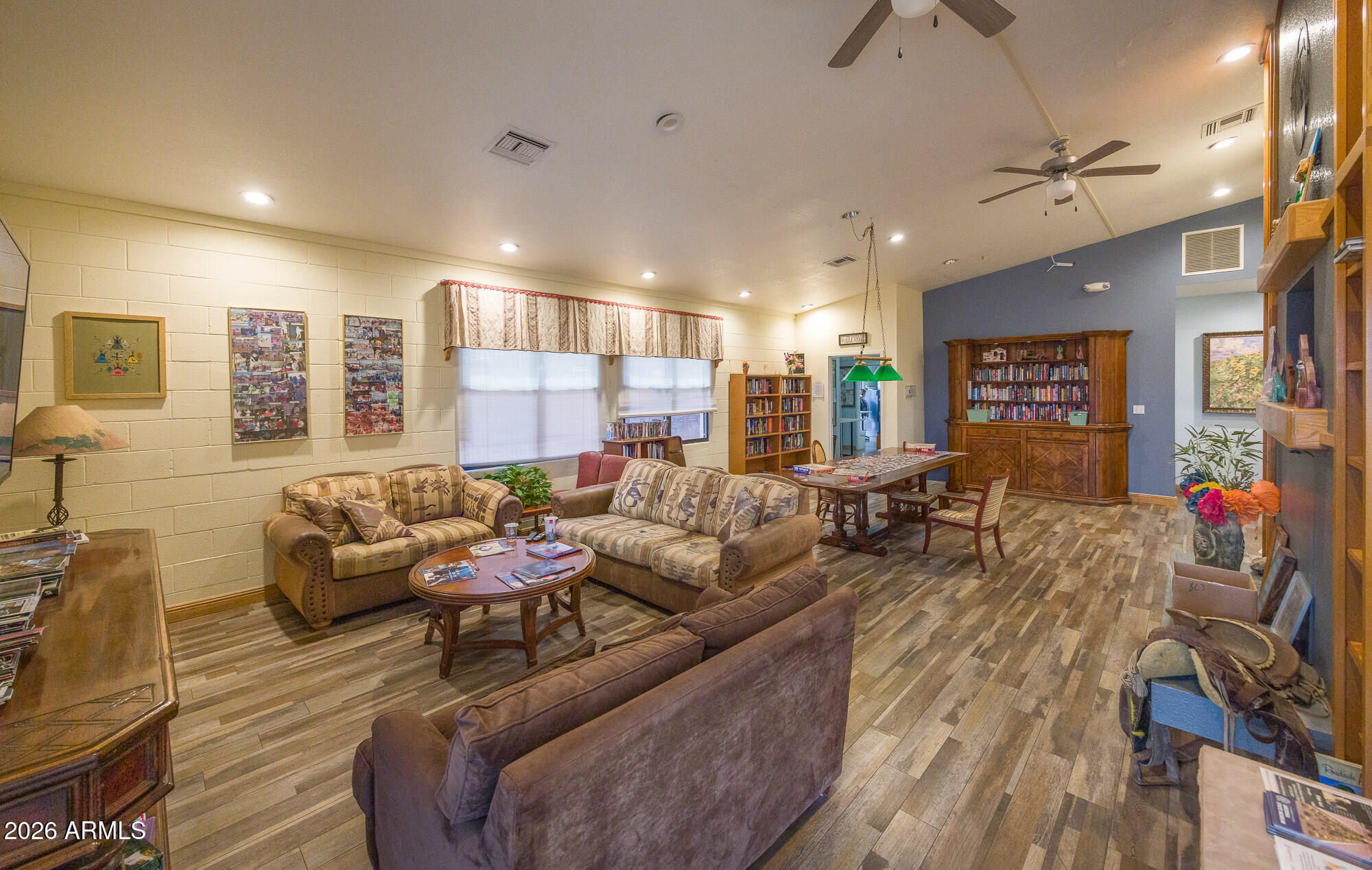 1030 Barrel Cactus Ridge, Unit 39 Benson, AZ 85602 - Photo 27 of 36 a living room with furniture and a flat screen tv
