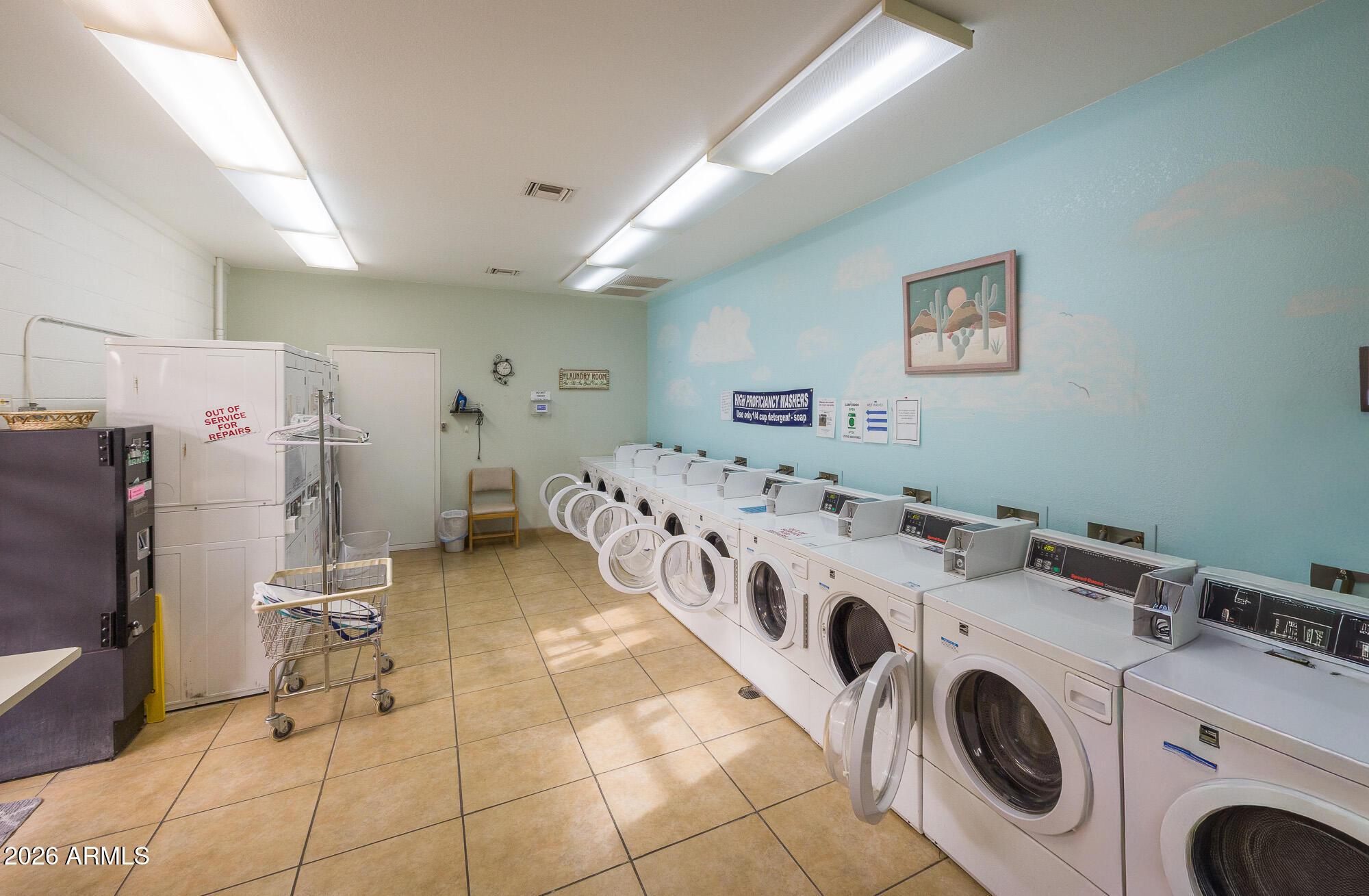 1030 Barrel Cactus Ridge, Unit 39 Benson, AZ 85602 - Photo 28 of 36 a utility room with dryer and washer