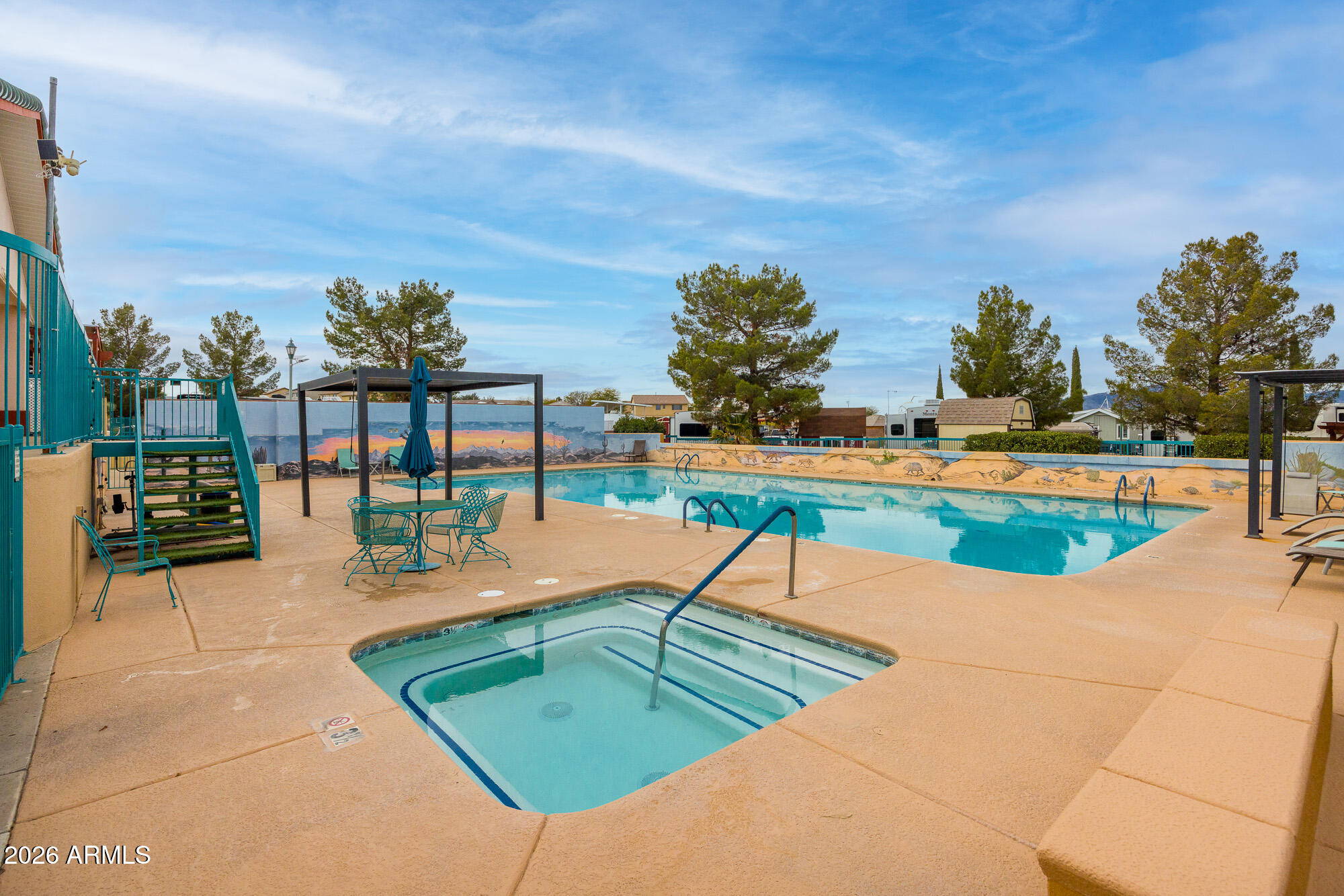 1030 Barrel Cactus Ridge, Unit 39 Benson, AZ 85602 - Photo 32 of 36 an outdoor space with seating