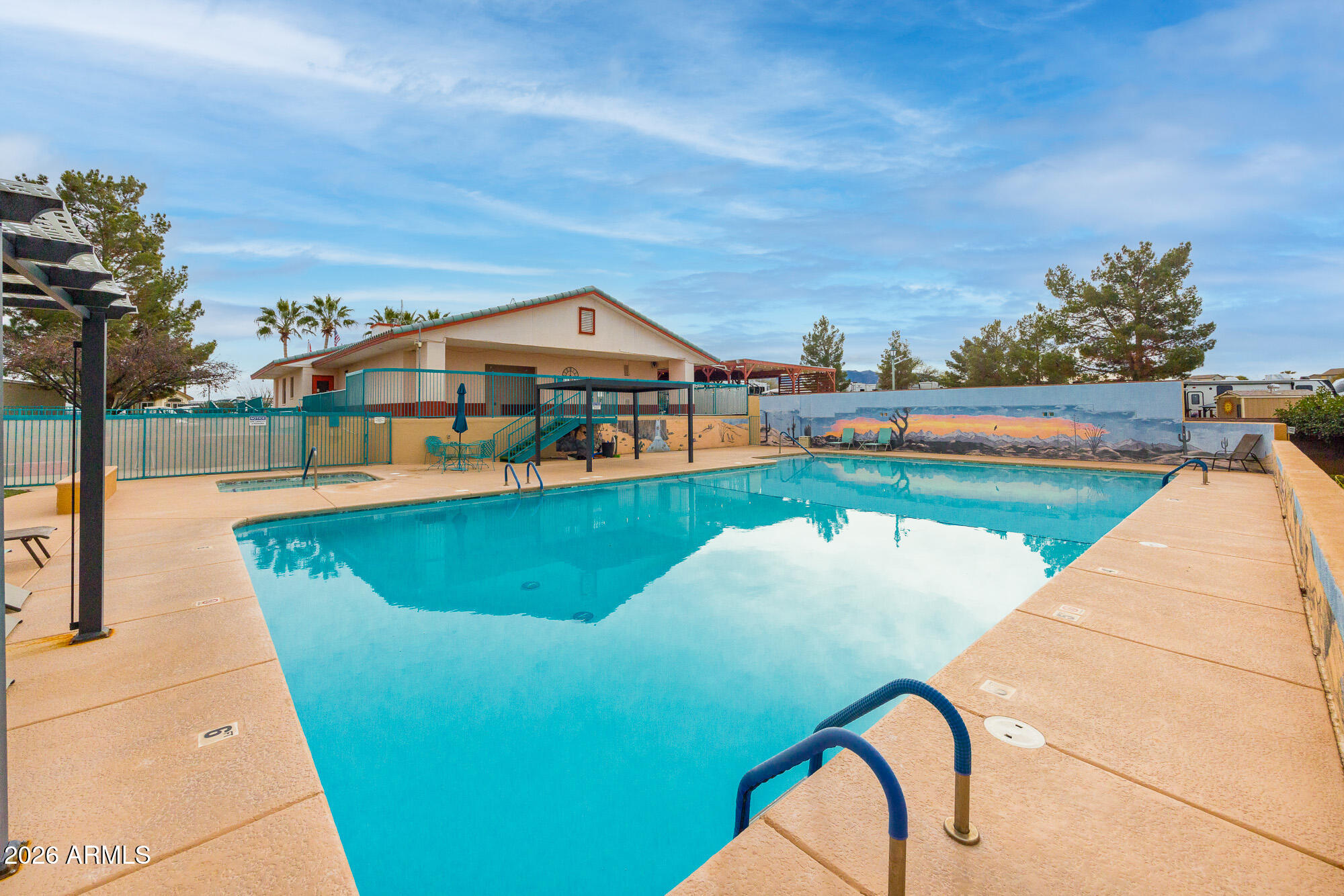 1030 Barrel Cactus Ridge, Unit 39 Benson, AZ 85602 - Photo 33 of 36 a view of a swimming pool with a patio