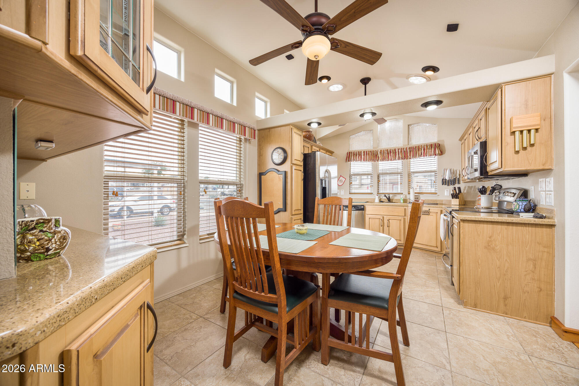 1030 Barrel Cactus Ridge, Unit 39 Benson, AZ 85602 - Photo 6 of 36 a view of a dining room with furniture and chandelier