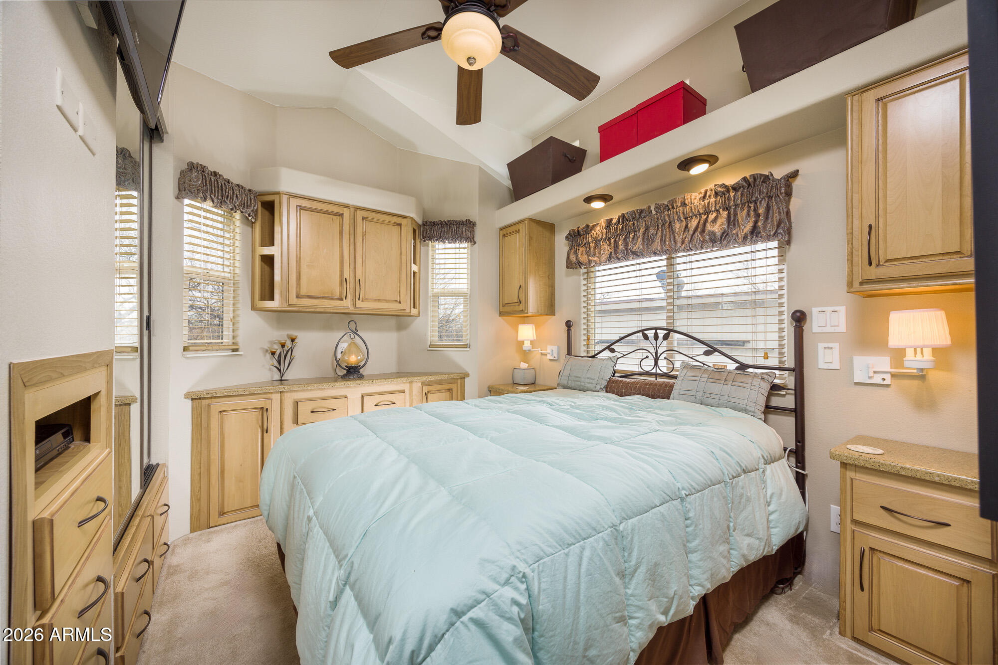 1030 Barrel Cactus Ridge, Unit 39 Benson, AZ 85602 - Photo 10 of 36 a bedroom with a bed next to a window with the outer view