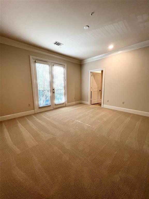 6525 Bandera Avenue, Unit 2B Dallas, TX 75225 - Photo 11 of 24 a view of an empty room with a window