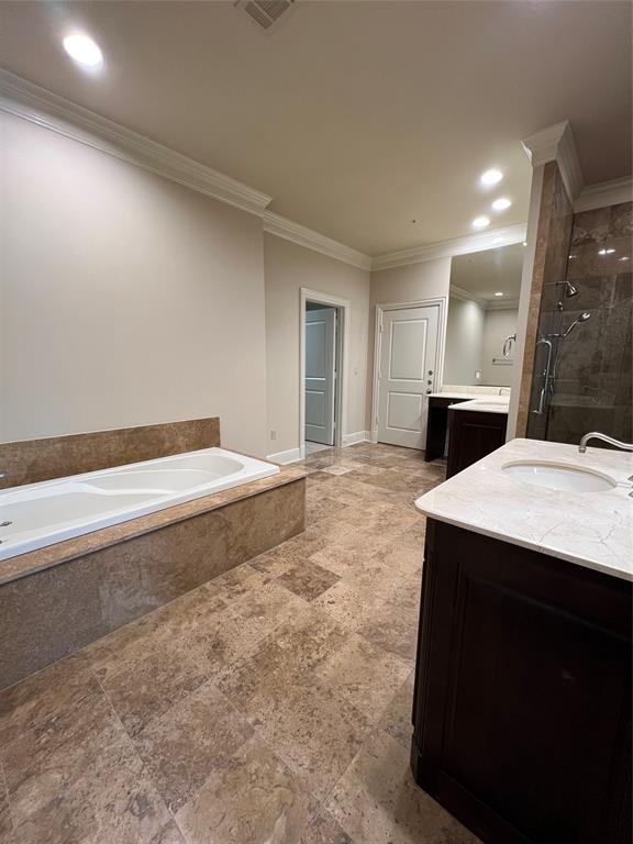 6525 Bandera Avenue, Unit 2B Dallas, TX 75225 - Photo 12 of 24 a spacious bathroom with a granite countertop sink and a mirror