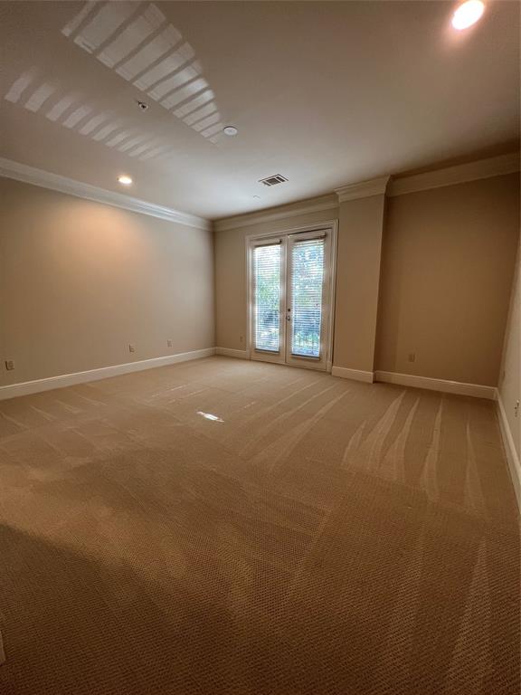6525 Bandera Avenue, Unit 2B Dallas, TX 75225 - Photo 20 of 24 an empty room with windows