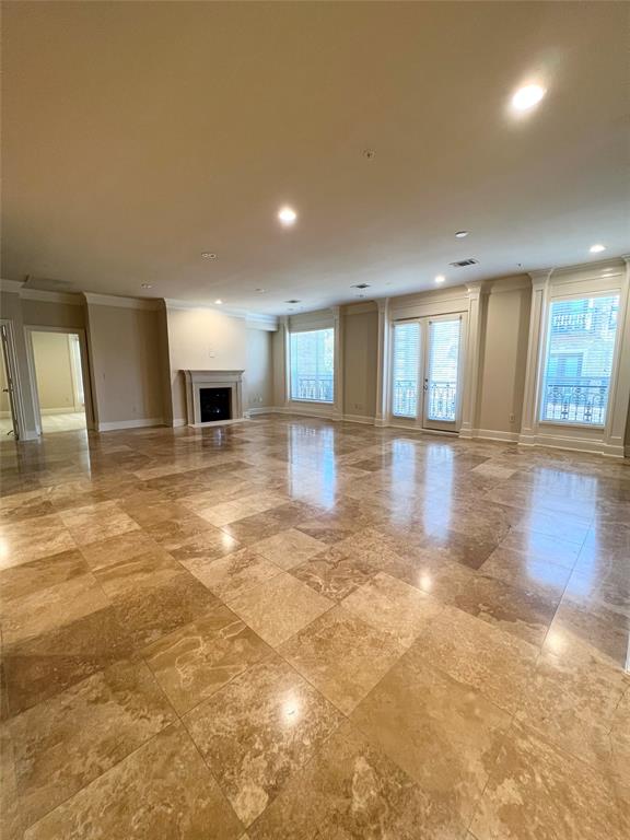 6525 Bandera Avenue, Unit 2B Dallas, TX 75225 - Photo 21 of 24 a view of a livingroom with a fireplace