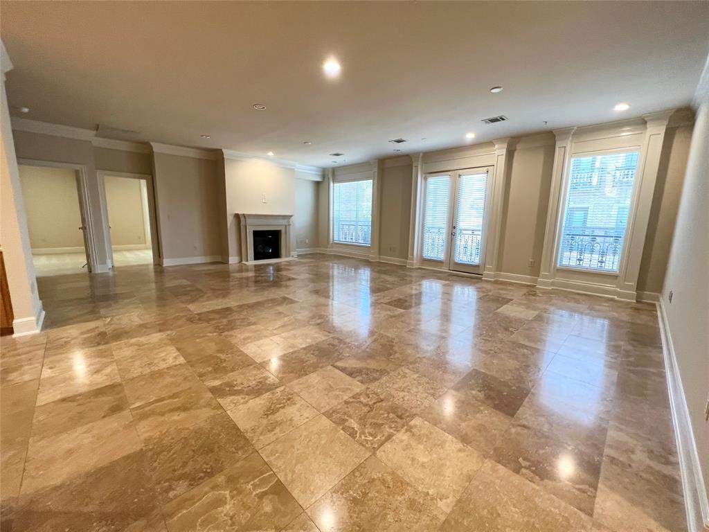 6525 Bandera Avenue, Unit 2B Dallas, TX 75225 - Photo 5 of 24 a view of an empty room and window