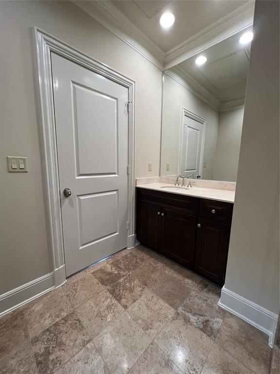 6525 Bandera Avenue, Unit 2B Dallas, TX 75225 - Photo 9 of 24 a spacious bathroom with a double vanity sink and a mirror