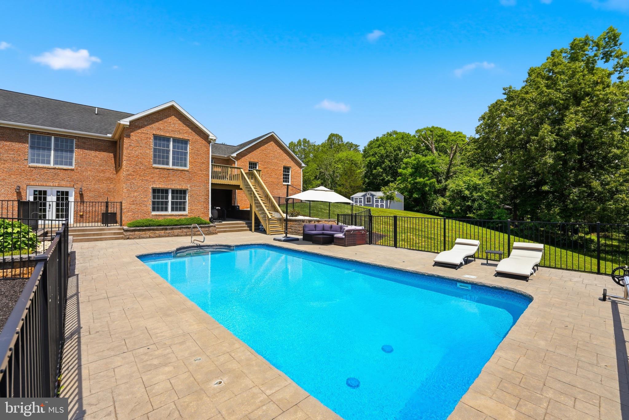 11337 Old Stillhouse Road Boston, VA 22713 - Photo 50 of 58 a view of a house with pool and chairs