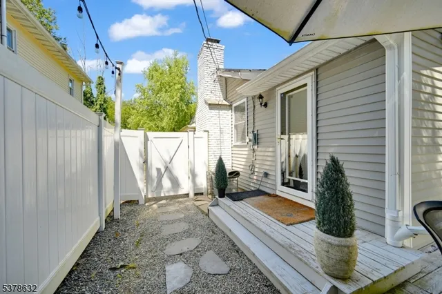 a view of a porch with seating space