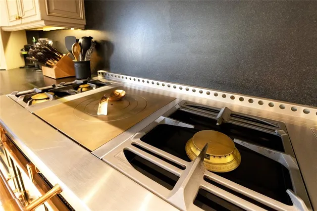 a bathroom with a sink a mirror and shower